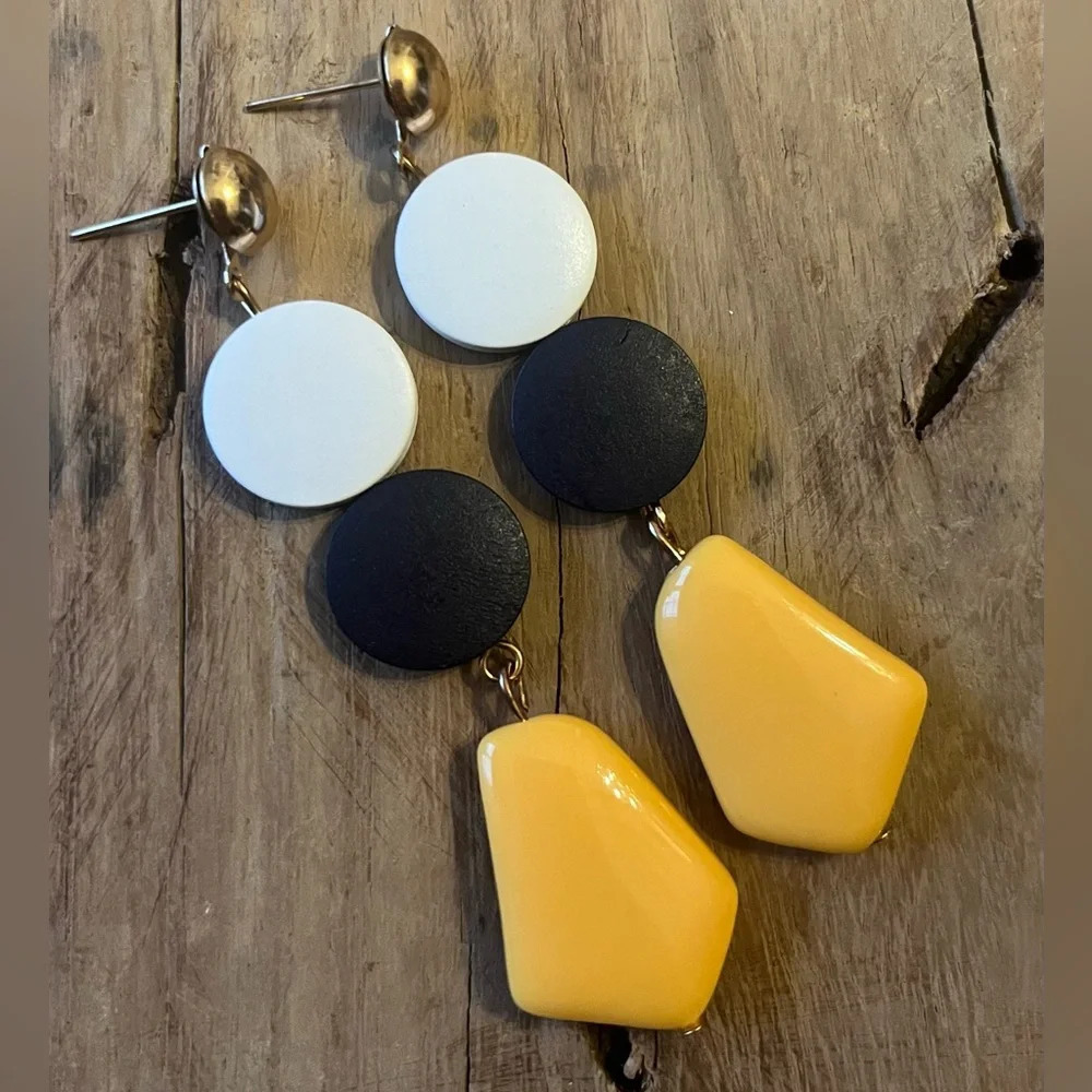 Brand new adorable black, gold and white dangle earrings. Perfect for GAME DAY